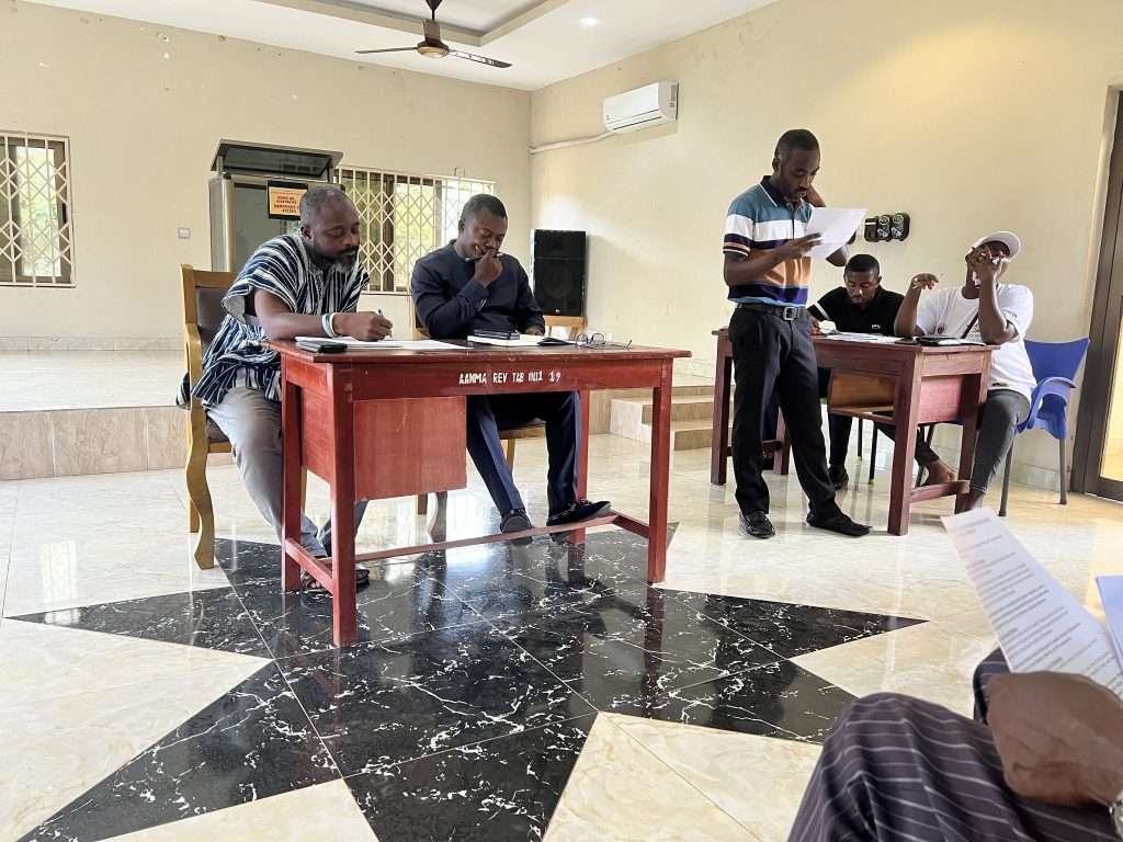 An Executive Committee Meeting.